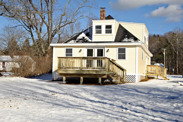 view of front of property featuring a wooden deck