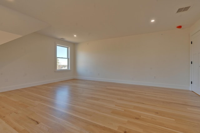 bonus room featuring light wood-type flooring