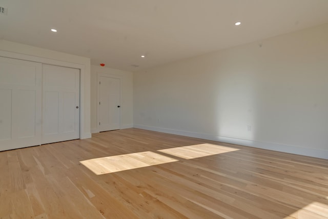 unfurnished bedroom with light hardwood / wood-style floors