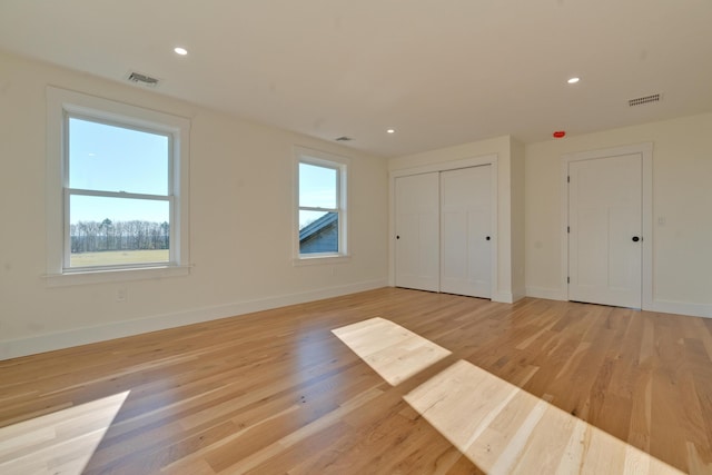 unfurnished bedroom featuring light hardwood / wood-style flooring