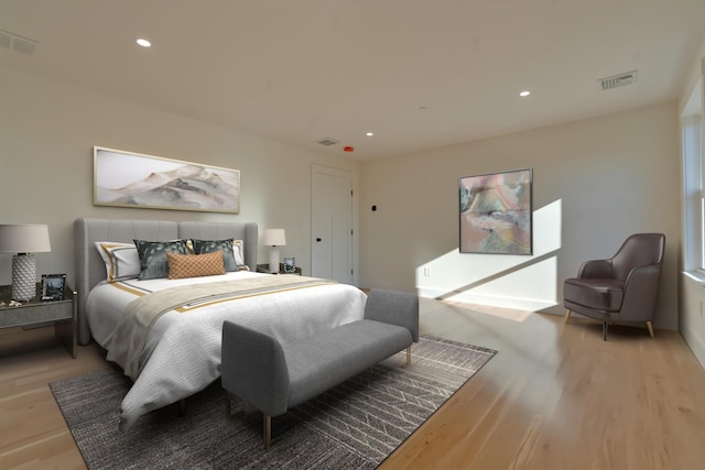 bedroom with light hardwood / wood-style flooring