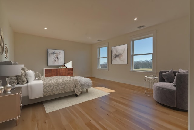 bedroom with light wood-type flooring