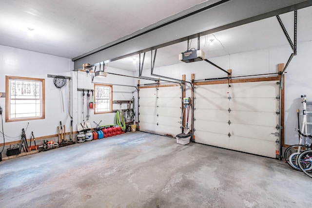 garage featuring a garage door opener