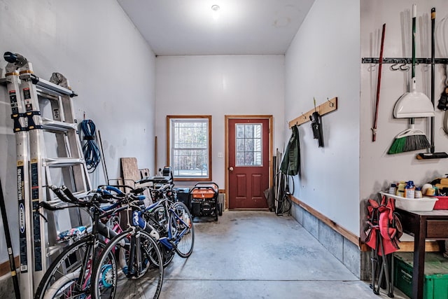 foyer featuring unfinished concrete floors