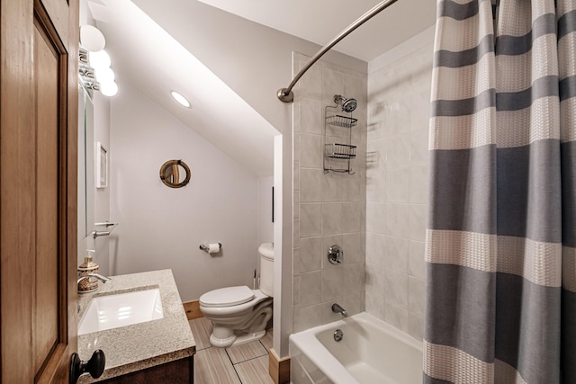 bathroom featuring shower / bath combo with shower curtain, toilet, lofted ceiling, baseboards, and vanity