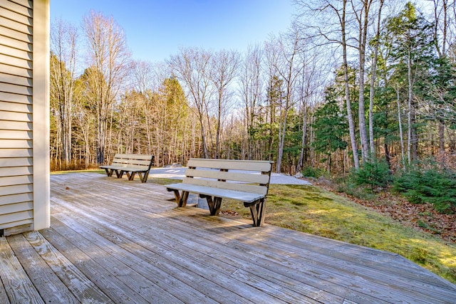 wooden terrace with a forest view