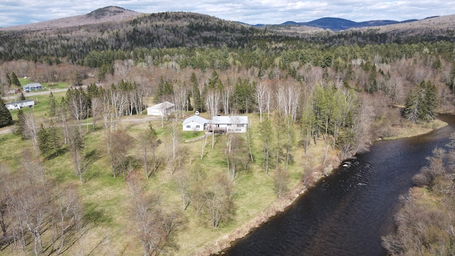 drone / aerial view with a water and mountain view