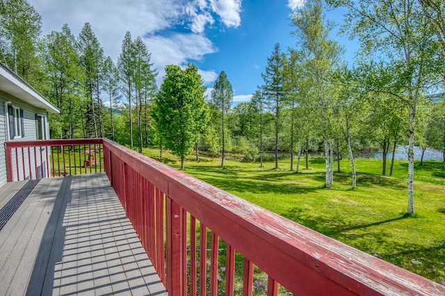 deck featuring a yard