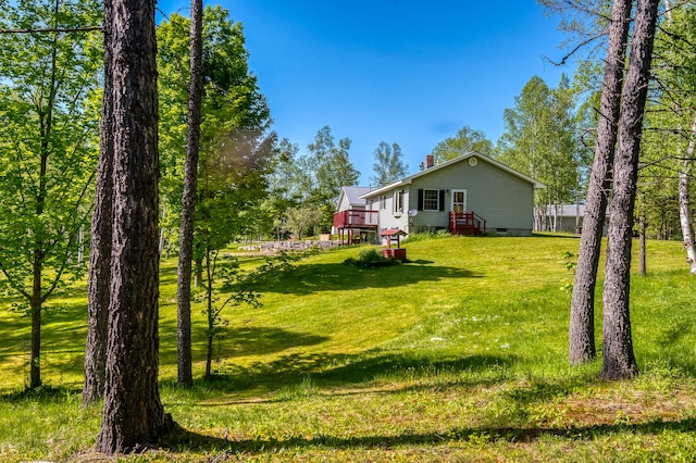 view of yard with a deck