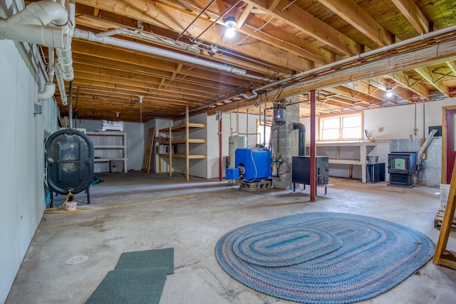 basement featuring a wood stove