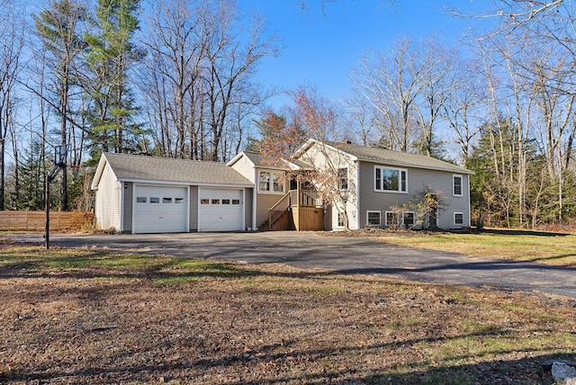 view of front of property with a garage