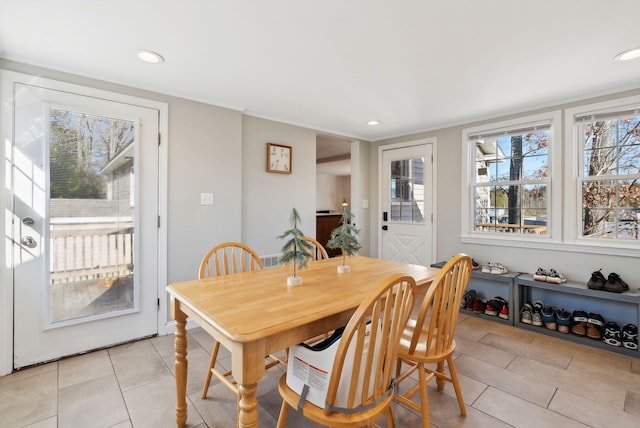 dining space with light tile patterned flooring