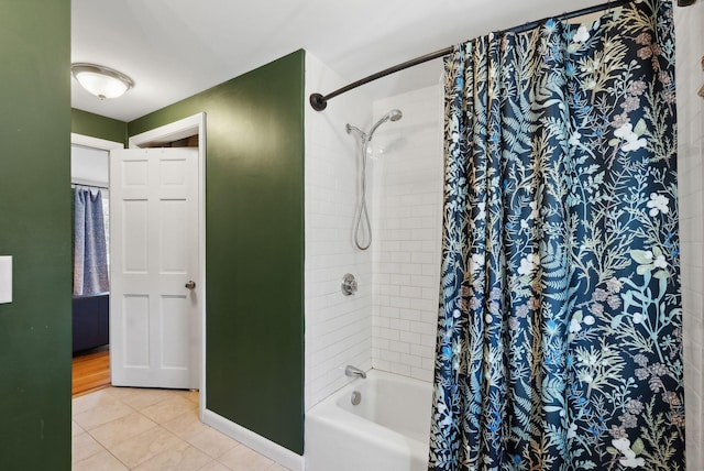 bathroom with tile patterned floors and shower / bathtub combination with curtain