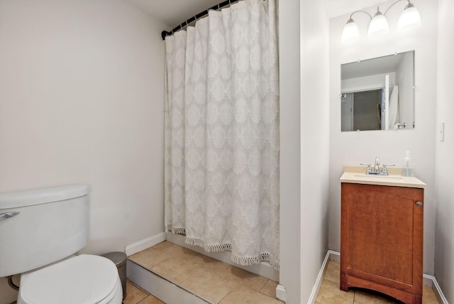 bathroom featuring curtained shower, tile patterned flooring, vanity, and toilet