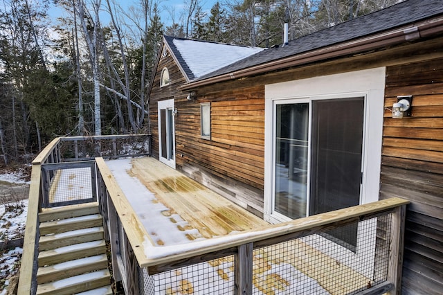 view of snow covered deck