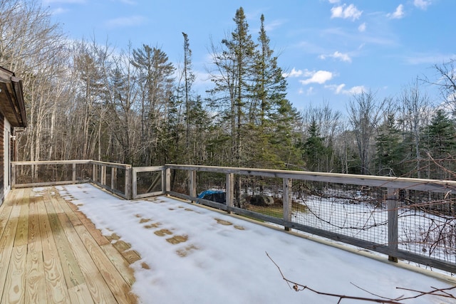 view of snow covered deck