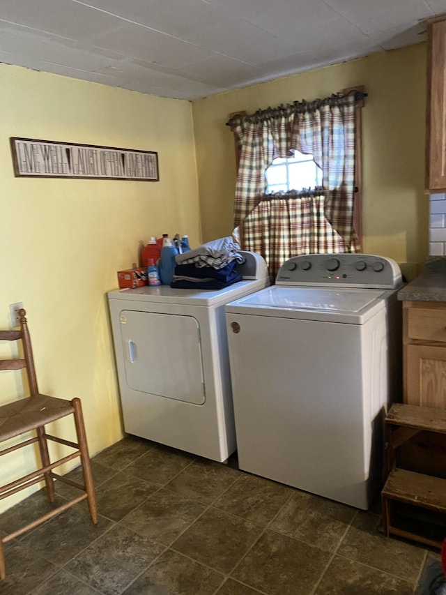 laundry area with cabinets and independent washer and dryer