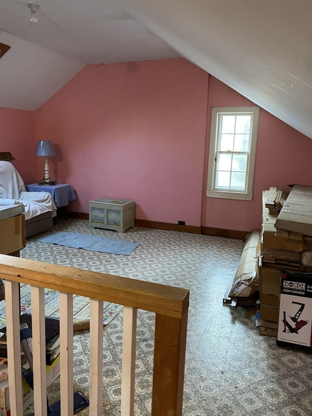 bonus room featuring carpet flooring and lofted ceiling