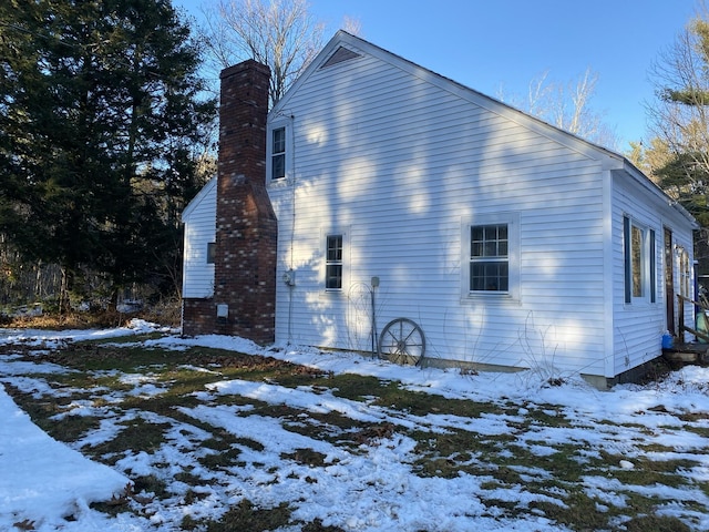 view of snow covered property