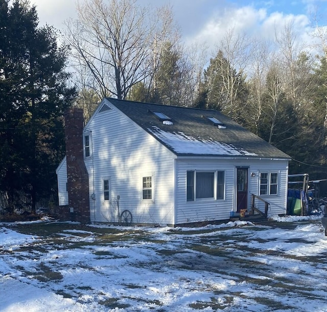 view of snow covered house