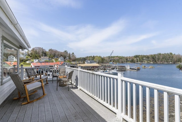 deck featuring a water view