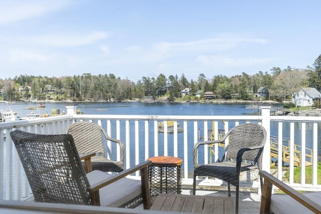 balcony featuring a water view