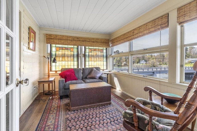 sunroom featuring wooden ceiling