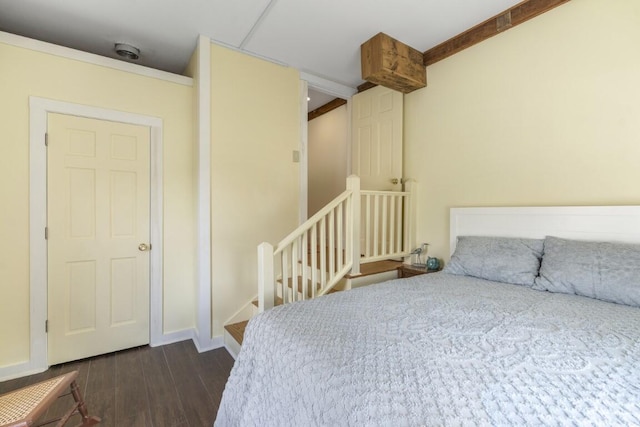 bedroom featuring dark wood-type flooring