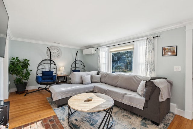 living room featuring hardwood / wood-style flooring, a wall mounted air conditioner, and ornamental molding