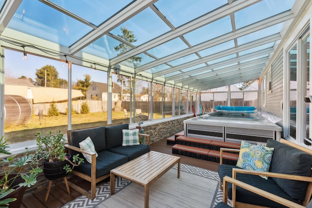 sunroom / solarium featuring vaulted ceiling