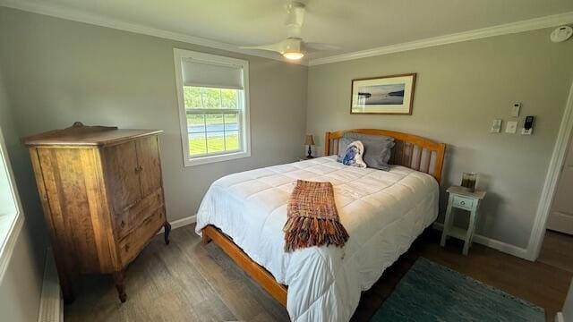 1063 Main St, Saint Francis, ME 04773 - bedroom featuring wood finished floors, crown molding, and a ceiling fan