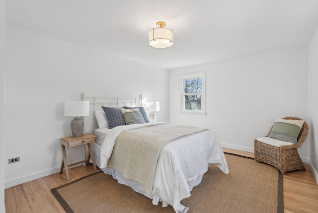 bedroom featuring hardwood / wood-style flooring