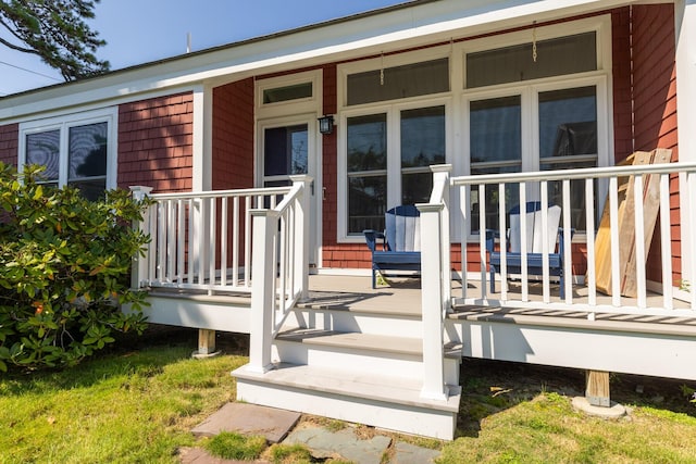 entrance to property with a porch