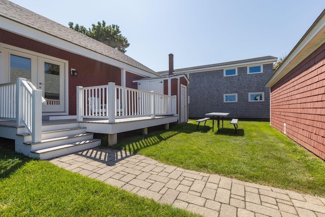 view of yard with a deck