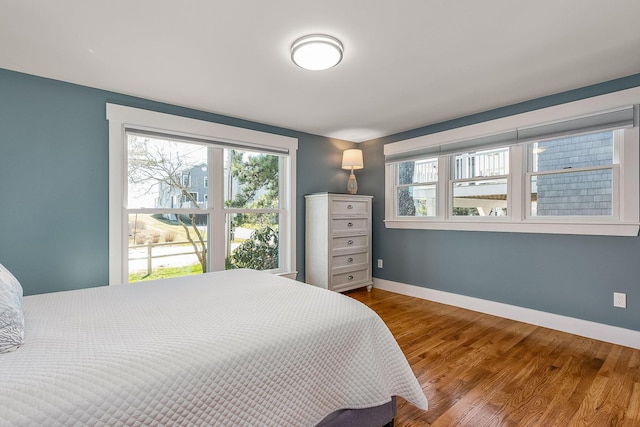 bedroom featuring wood-type flooring