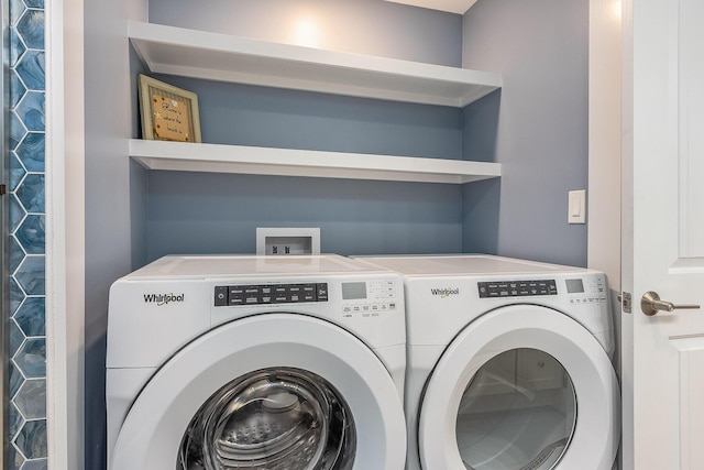 laundry area with separate washer and dryer