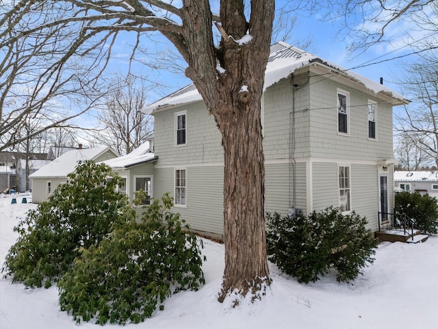 view of snow covered property