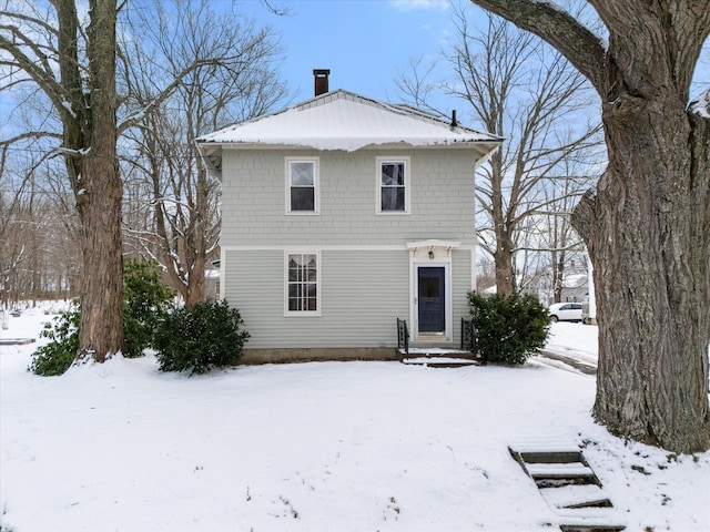 view of snow covered property