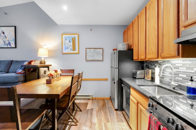 kitchen featuring electric range, sink, dishwasher, backsplash, and light wood-type flooring