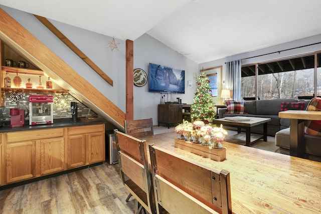 8 Sunrise Dr Unit C122, Newry, ME 04261 - indoor dry bar featuring lofted ceiling, wood finished floors, and healthy amount of natural light