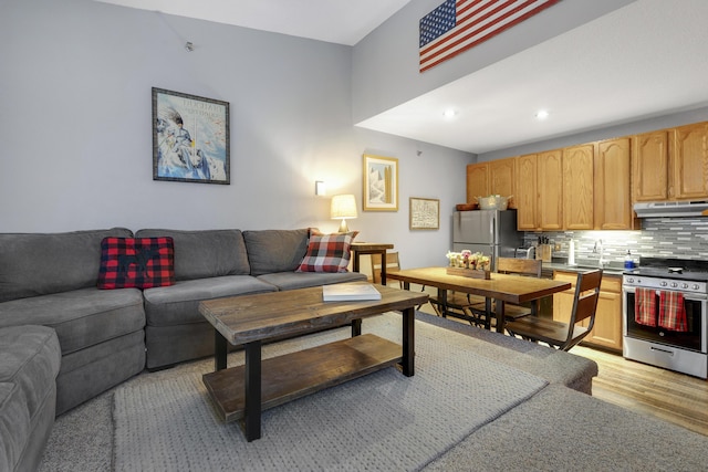 8 Sunrise Dr Unit C122, Newry, ME 04261 - living room with light wood finished floors and recessed lighting