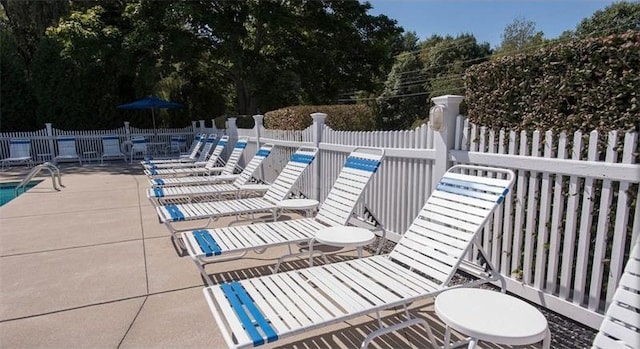 view of patio featuring a community pool