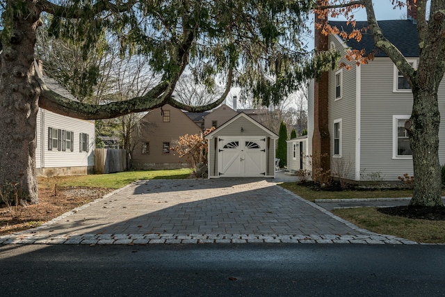 view of home's exterior with an outbuilding and a garage