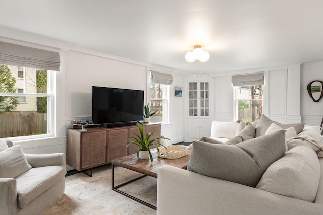 living room featuring a healthy amount of sunlight