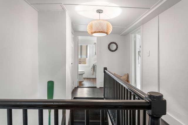 hall with wood-type flooring