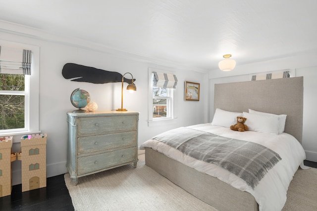 bedroom featuring wood-type flooring