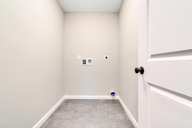 washroom with washer hookup, light tile patterned floors, and electric dryer hookup