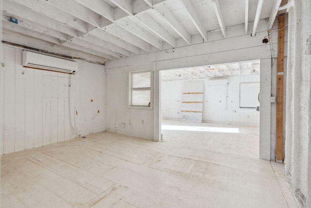 basement with a wall mounted AC