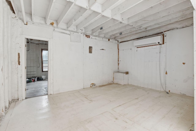 empty room featuring an AC wall unit