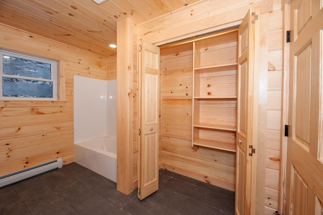 bathroom featuring wooden ceiling, a baseboard radiator, a bathing tub, and wooden walls